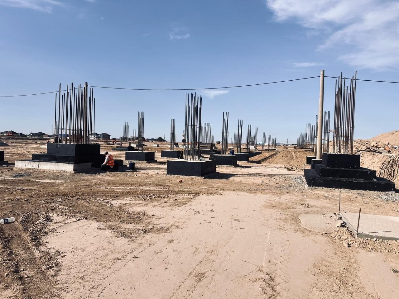 Foundation pockets with rebar starters on site